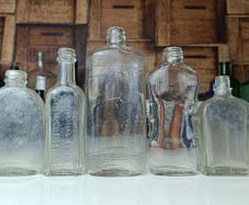 483 - Set of 7 Vintage Clear Glass Screw Cork Top Collectible Decorative Bottles