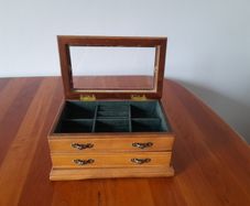 Wooden jewellery box with metal handles