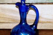 Antique cobalt blue pitcher with lid