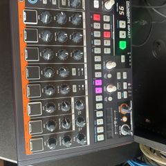 Arturia Drumbrute Impact and desk saver