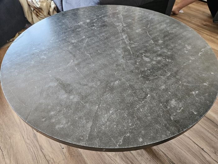 Round dining table with a matching coffee table