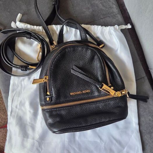 Genuine Michael Kors black mini backpack convertible crossbody in excellent condition