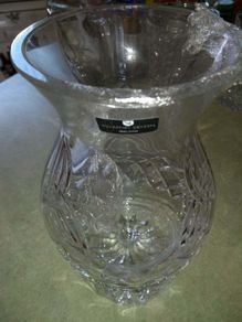Killarney crystal candle holder is small slight chip on top of it 23 x 12 cm.
