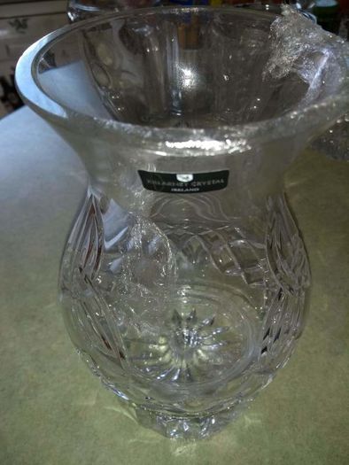 Killarney crystal candle holder is small slight chip on top of it 23 x 12 cm.