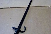 19th century French bayonet with brass and wooden handle.