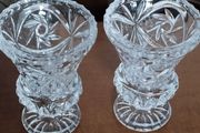 A pair of magnificent diamond-cut crystal vases.