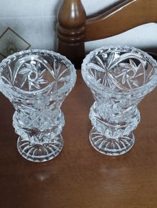 A pair of magnificent diamond-cut crystal vases.
