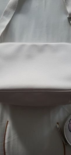 Stitch crossbody bag with matching purse.