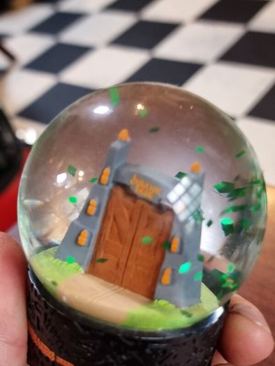 Jurassic Park gates snowglobe