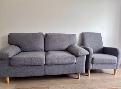 Sofa and armchair (priced separately)