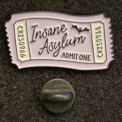 Insane asylum, admit one ticket, pin back badge.