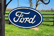 Ford hanging cast iron sign