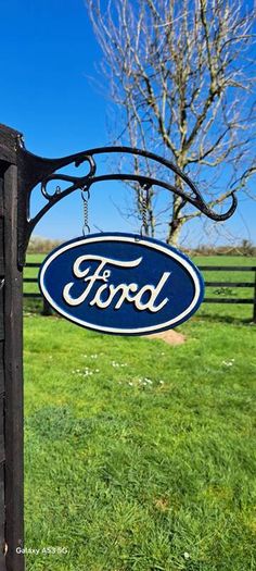 Ford hanging cast iron sign