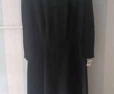 Vintage Black Dress with signature hardware.