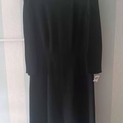 Vintage Black Dress with signature hardware.