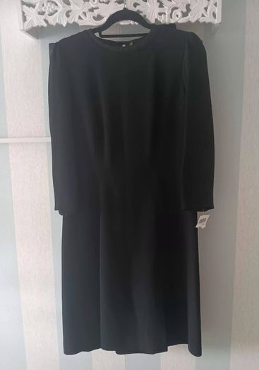 Vintage Black Dress with signature hardware.