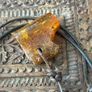 Raw Amber on leather Image 3