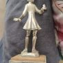 The figurine is a vintage Image 2