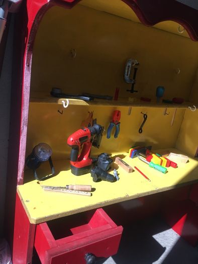 Kids work shop play station dresser with tools.