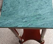 a pair of vintage marble top tables