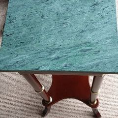 a pair of vintage marble top tables