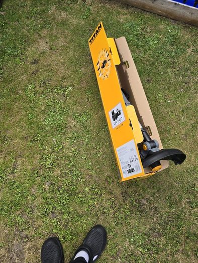 Titan grass strimmer.