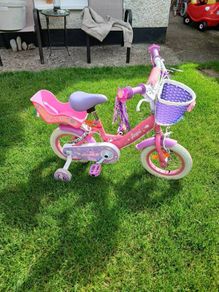 12" kids bike with with stabilisers no rust always kept indoors