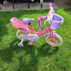 12" kids bike with with stabilisers no rust always kept indoors