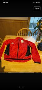 Cycle stowaway jacket. Brand Opitmum