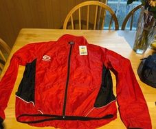 Cycle stowaway jacket. Brand Opitmum