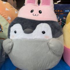 Koupen Chan with rabbit hat plushie