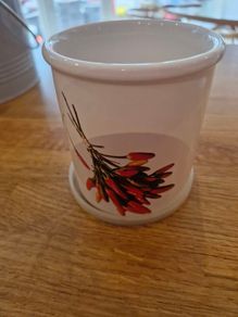 2 Beautiful storage jars/ containers with lids