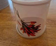 2 Beautiful storage jars/ containers with lids