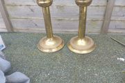 A pair of 9 inch brass candle stick holders