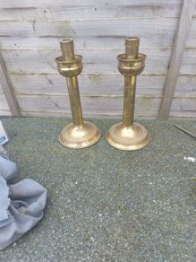 A pair of 9 inch brass candle stick holders