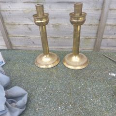A pair of 9 inch brass candle stick holders