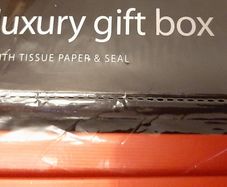 new luxury gift box Red with tissue paper in wrapping