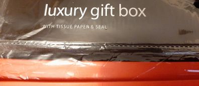new luxury gift box Red with tissue paper in wrapping