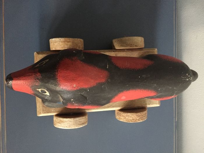 vintage wooden dog on wheels