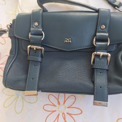 Handbag with handles and shoulder strap
