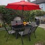 garden table and chairs with parasol Image 2