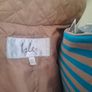 Quilted Isle gilet with knitted arm trim Image 10