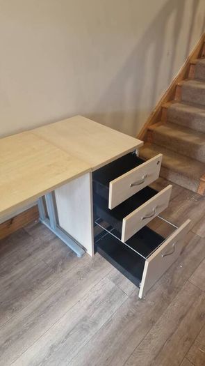 Office desk & filing cabinet.