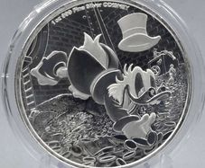 22025 Niue 1 oz Silver  Disney's Scrooge McDuck BU (In Capsule)