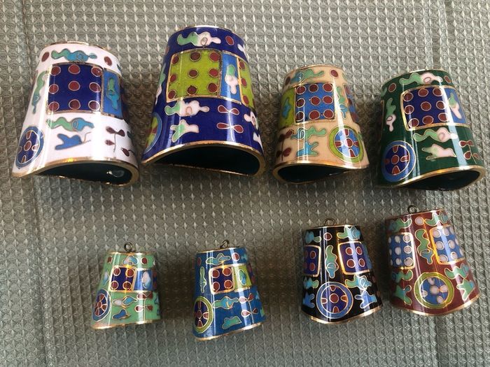 Enamel cloisonne graduated bells on wooden stand