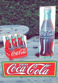 Vintage Coca Cola enamel signs