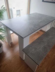 White and grey kitchen table with benches