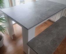 White and grey kitchen table with benches