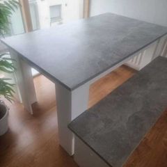 White and grey kitchen table with benches