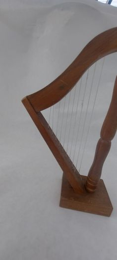 handcrafted wooden display harp ,,lovely display item for any man cave pub restaurant etc etc etc, buyer collects or pays postage.